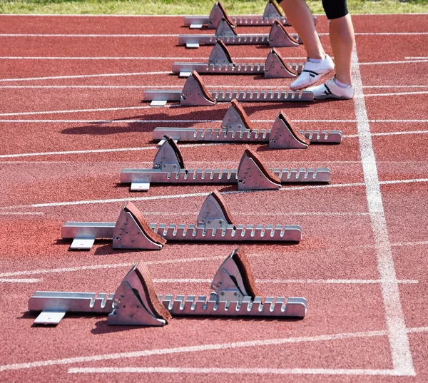 Running track and starting machines — Stock Photo, Image