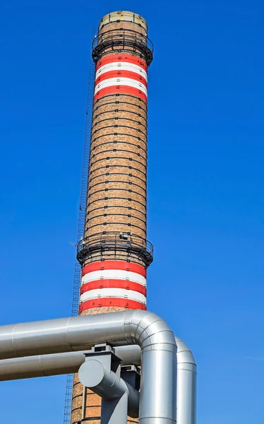 Pipeline and smoke stack of the power station — Stock Photo, Image