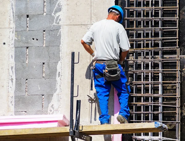 Trabajadores de la construcción en el trabajo — Foto de Stock