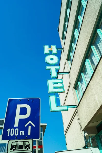 Hotel sign on the wall of a hotel building — Stock Photo, Image