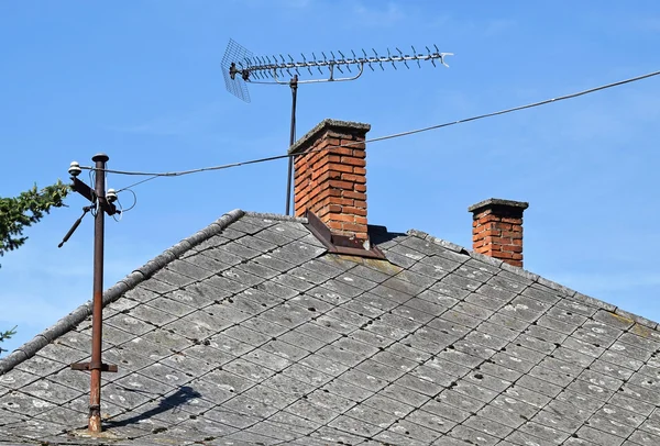 House roof with antennas — Stock Photo, Image