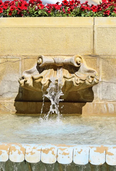 Fountain on the wall of a building — Stock Photo, Image