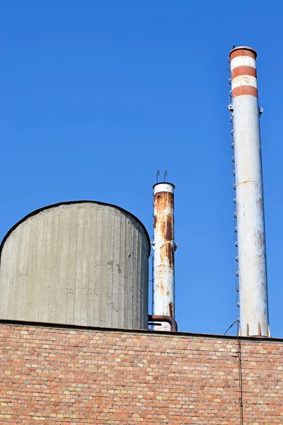 Smoke stack of a factory building — Stock Photo, Image