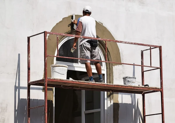 Trabajadores de la construcción en el trabajo — Foto de Stock