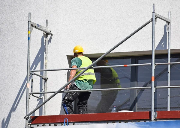 Trabajadores de la construcción en el trabajo — Foto de Stock