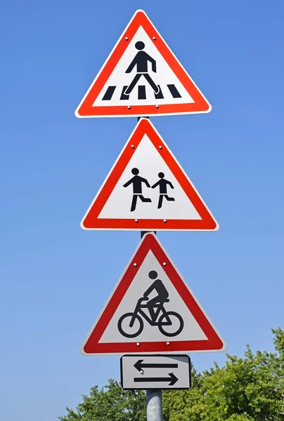 Pedestrian crossing and bicycle road signs — Stock Photo, Image