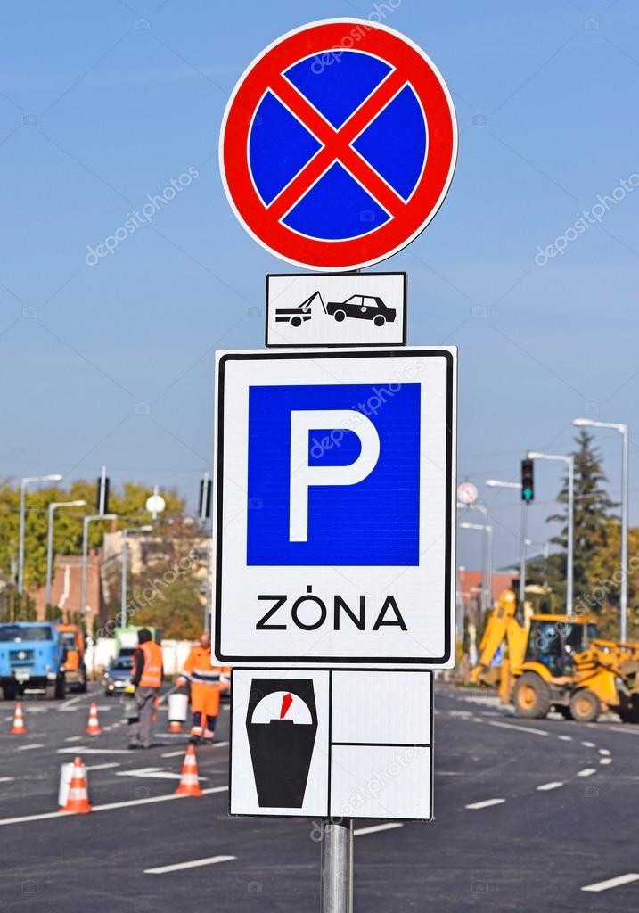 Parking zone and no stopping signs