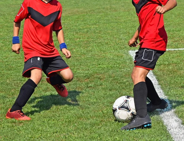 Young soccer players in action — Stock Photo, Image