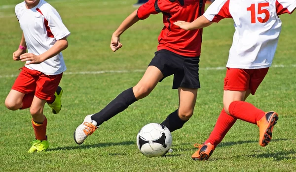 Young soccer players  in action — Stock Photo, Image
