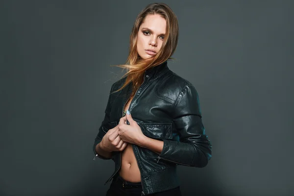 Portrait of sexy model wearing leather jacket — Stock Photo, Image