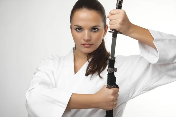 Aantrekkelijke jonge sexy vrouwen met samurai zwaard — Stockfoto