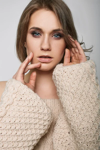 Portrait of beautiful blond woman in studio Stock Photo