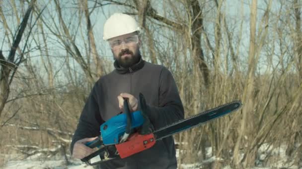 Portrait Caucasian Bearded Man Helmet Goggles Chainsaw His Hand Logging — Stock Video