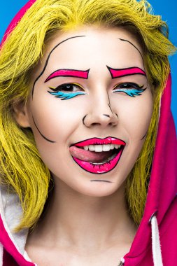 Profesyonel komik pop sanat makyaj ile sürpriz genç kadının fotoğrafını. Yaratıcı güzellik tarzı.