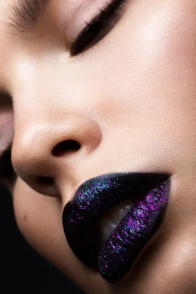 Portrait of a beautiful girl. Brilliant glossy lips closeup. Purple glitter on black lipstick — Stock Photo, Image