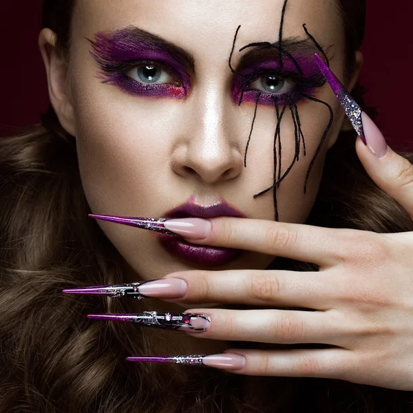 Woman in the image of spider with creative art makeup and long nails. Manicure design, beauty face. — Stock Photo, Image