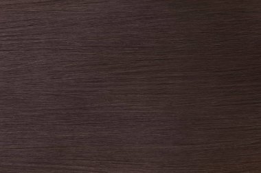 Bir grup parlak düz kahverengi saçın yakın çekim görüntüsü.