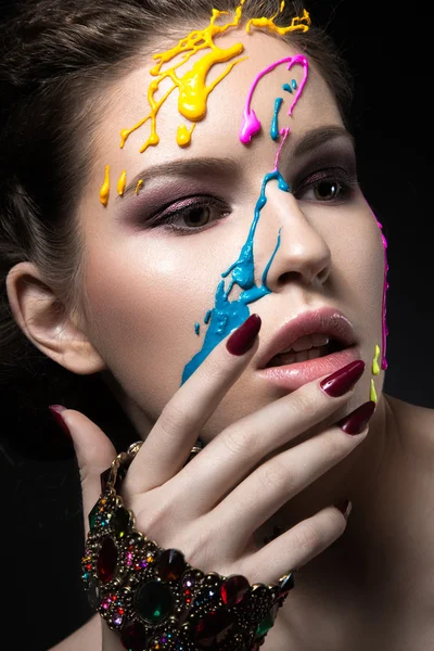 Portrait of a beautiful Girl with color paint on her face. Beauty face — Stock Photo, Image