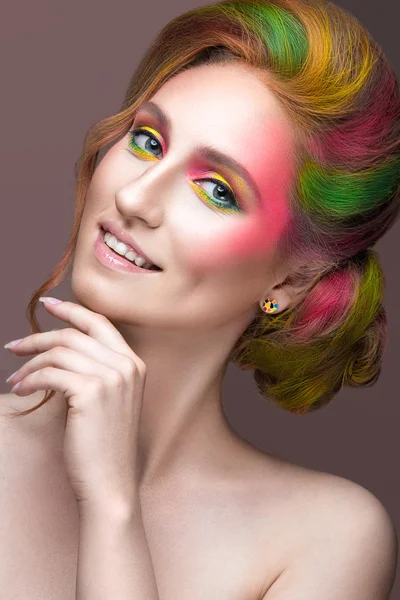 Fashion Girl with colored face and hair painted. Art beauty image. — Stock Photo, Image