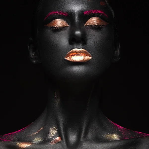 Fashion portrait of a dark-skinned girl with color make-up. Beauty face. — Stock Photo, Image