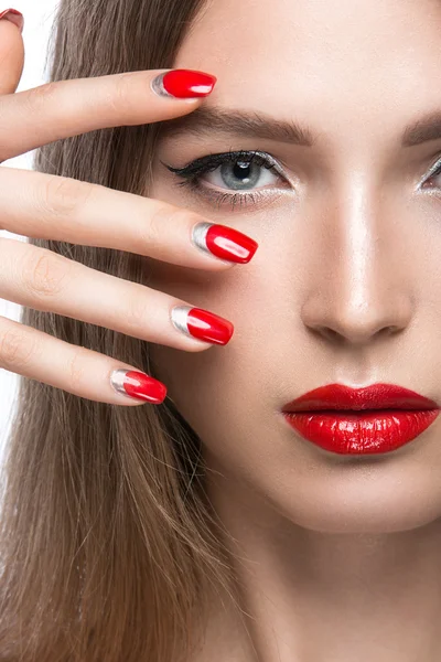 Beautiful young girl with a bright make-up and red nails. Beauty face. — Stock Photo, Image