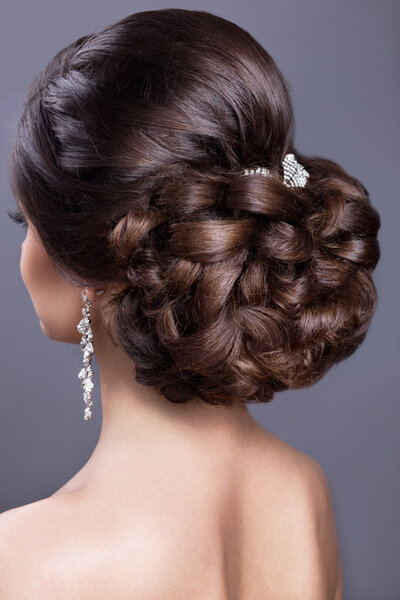 Beautiful  woman in image of the bride. Beauty hair. Hairstyle back view