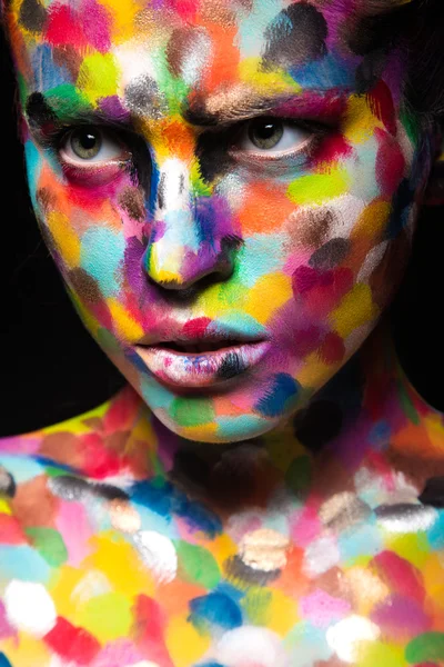 Girl with colored face painted. Art beauty image. — Stock Photo, Image