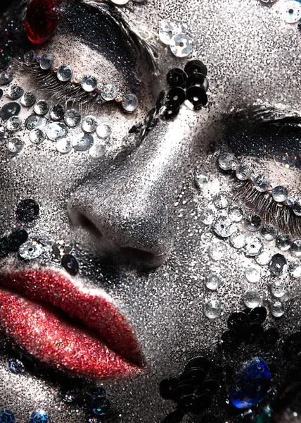 Girl with glitter and rhinestones on her face. Beauty close-up. — Stock Photo, Image