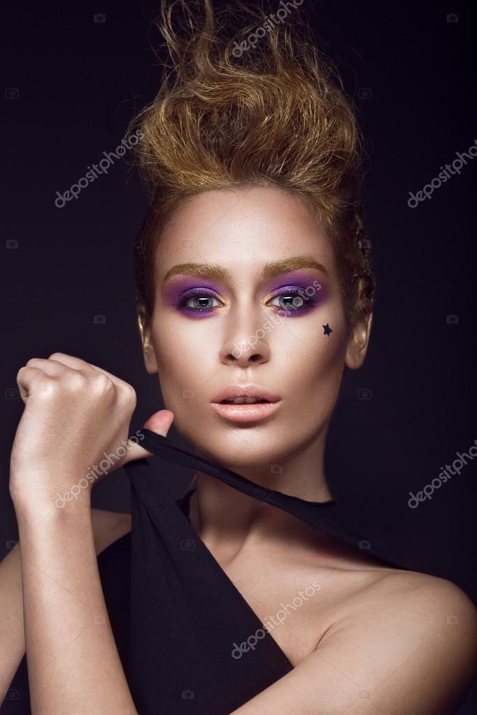 Daring Girl With A Mohawk Hairstyle Painted In Gold Punk Style