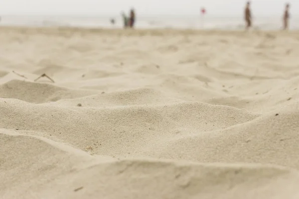 Kum plajı dokusu arka planı.