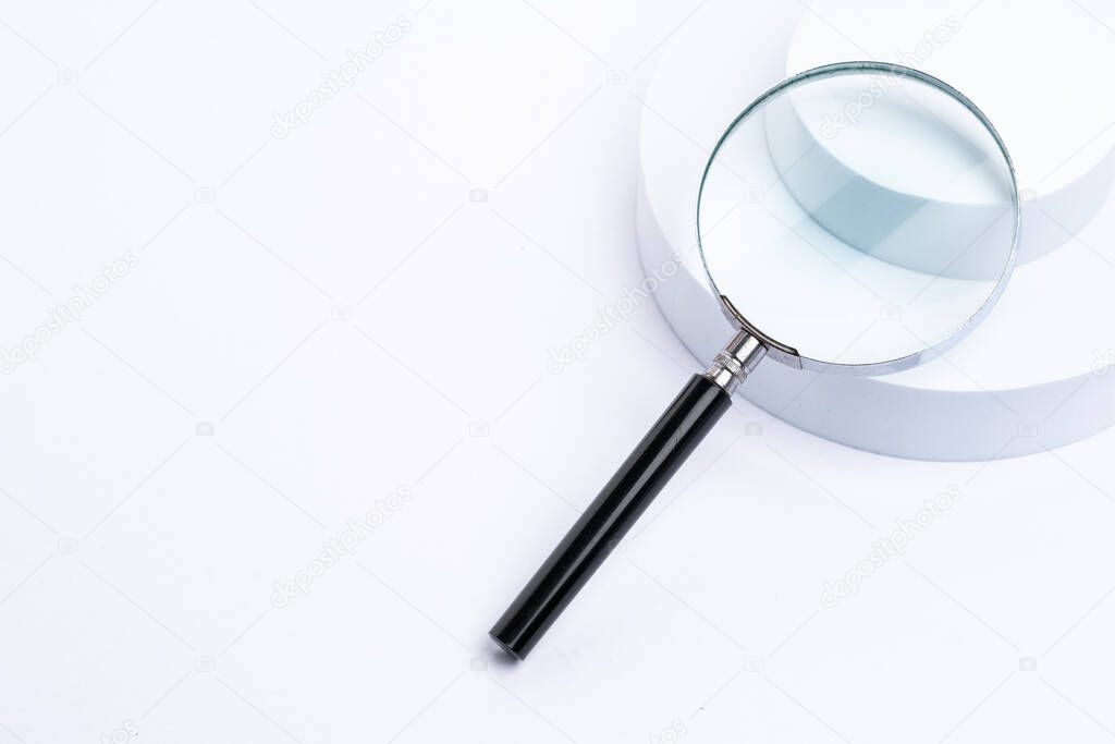 Magnifying glass on white background