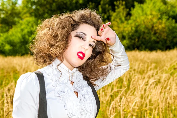 Beautiful girl with long eyelashes outdoors — Stock Photo, Image