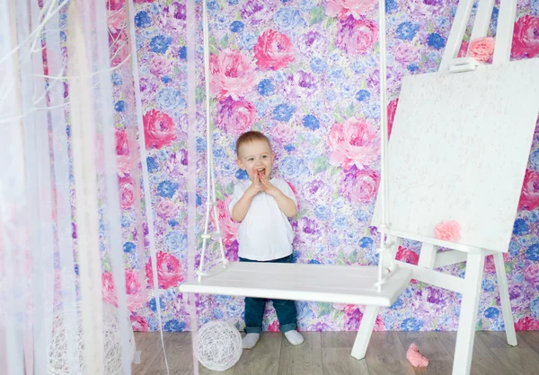 The boy plays in a nursery. — Stock Photo, Image