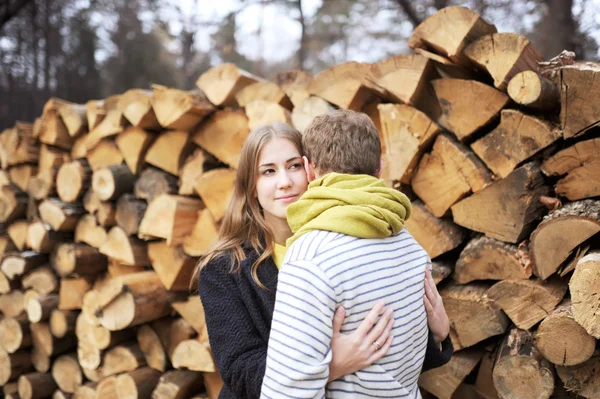 The young family enjoys in the fall — Stock Photo, Image