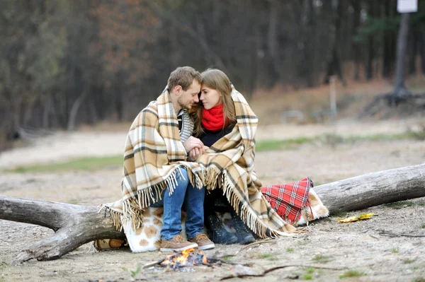 Married couple at the river during the autumn period — Stock Photo, Image