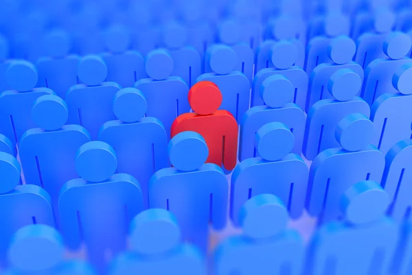 Червона людина в натовпі блакитних людей — стокове фото