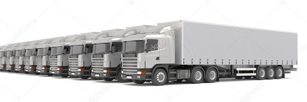 silver cargo trucks parked in a row
