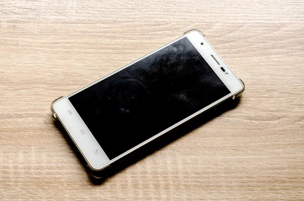 Ahşap masa arka plan akıllı telefon