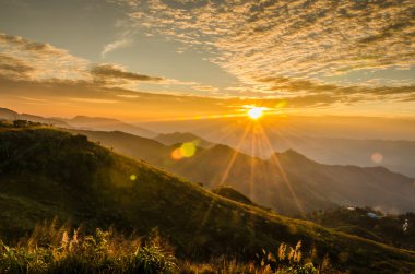 Günbatımı Phatung dağ, Chiang Rai, Tayland
