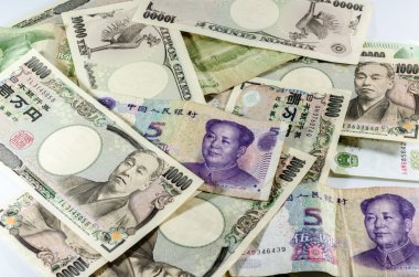 Arka plan Asya para birimi (Çin para yuan ve Japon Y