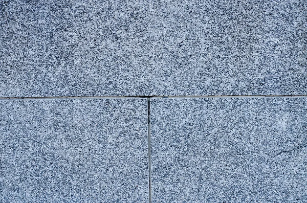 Old brick stone on ground, background.