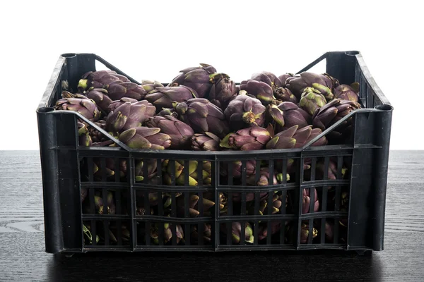 Fresh artichokes in a box — Stock Photo, Image