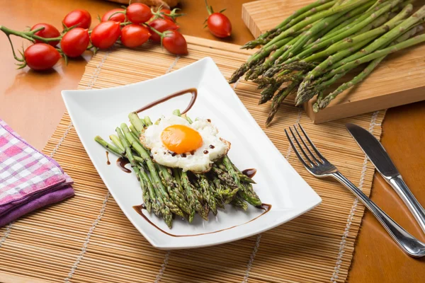 Asparagus cooked with egg — Stock Photo, Image