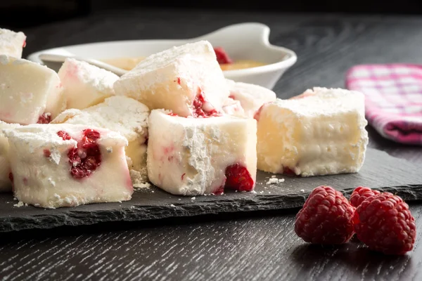 Panna cotta and raspberries — Stock Photo, Image