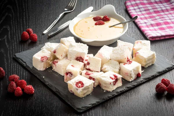 Panna cotta and raspberries — Stock Photo, Image