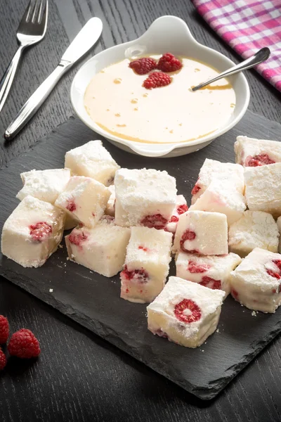 Panna cotta and raspberries — Stock Photo, Image