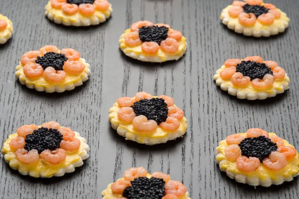 Canapes with shrimps and caviar Stock Image
