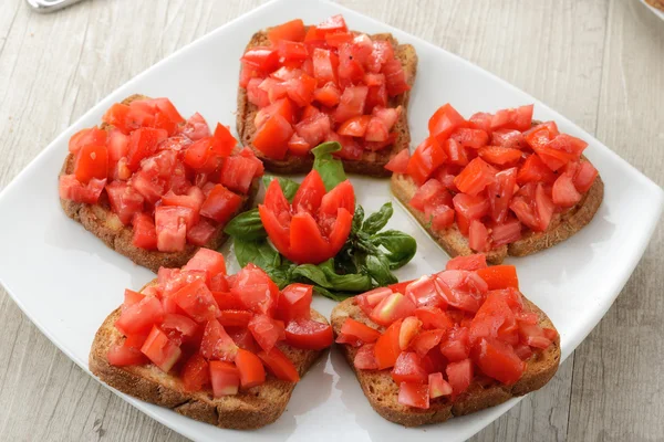 Friselle with tomatoes — Stock Photo, Image