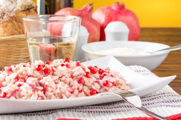 Risotto with pomegranate — Stock Photo, Image