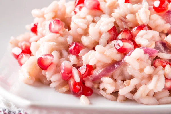 Risotto with pomegranate — Stock Photo, Image